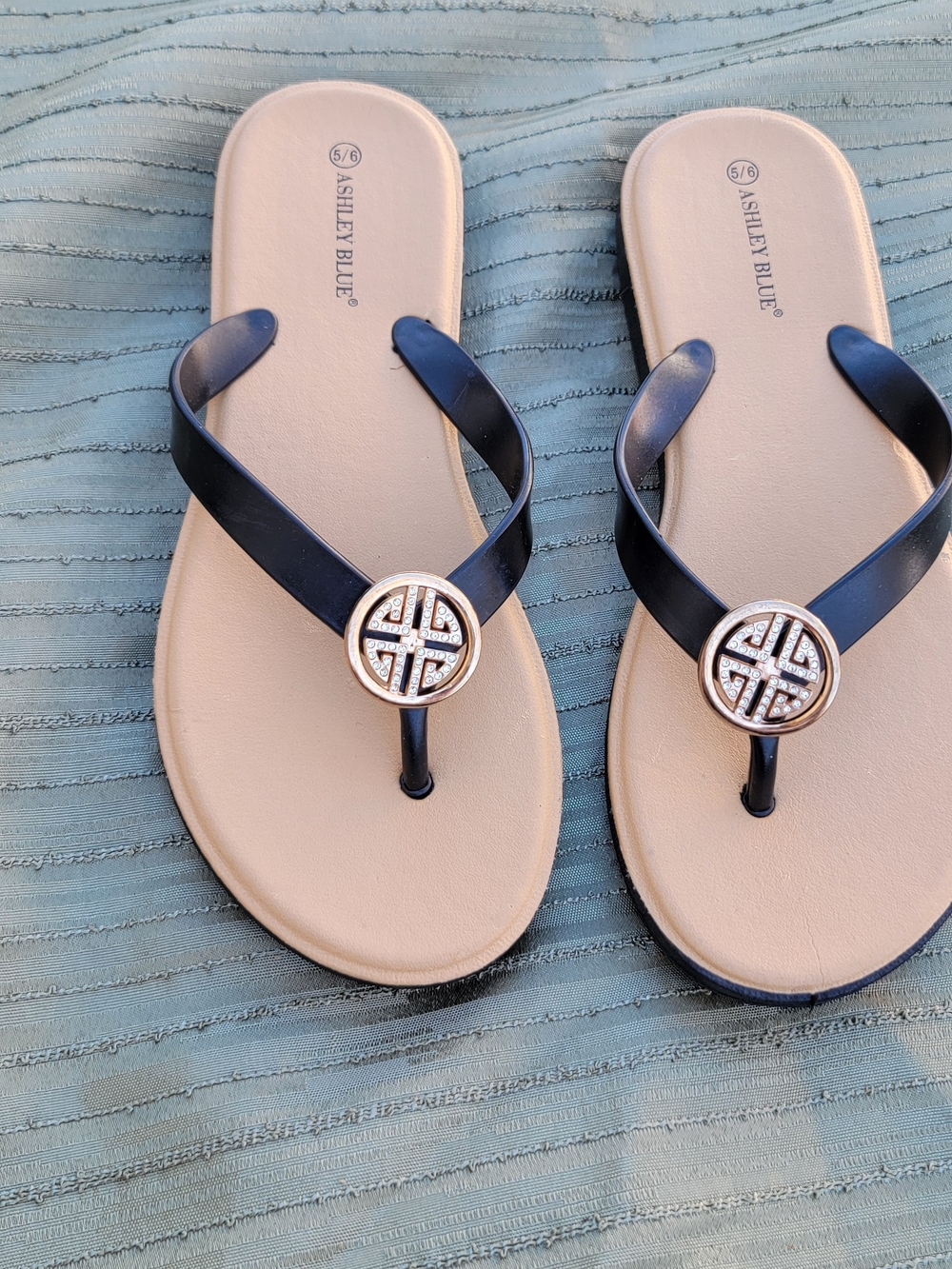 Ashley Blue Black Strap Sandals with Tan Footbed and Gold Medallion Accent